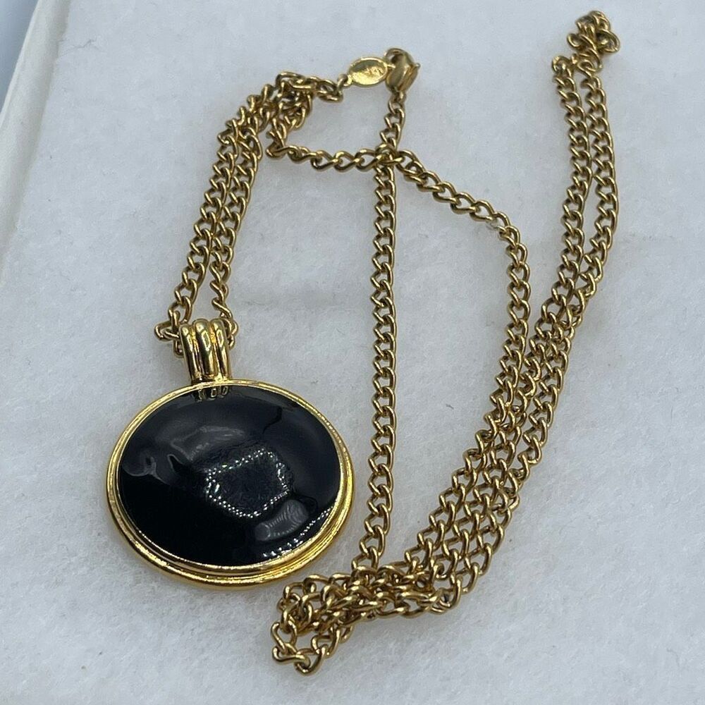 Vintage Napier bold 28” chain round black pendant .